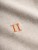 Noerregaard_T-Shirt_-_Seasonal-T-Shirt-LDM101155-206730-Light_Sand_Melange_Orange-5_1500x.jpg