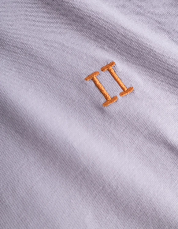 Noerregaard_T-Shirt_-_Seasonal-T-Shirt-LDM101155-648730-Light_Orchid_Orange-2_1500x (1).webp
